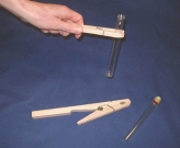 Pince en bois à ressort 25 cm pour tubes